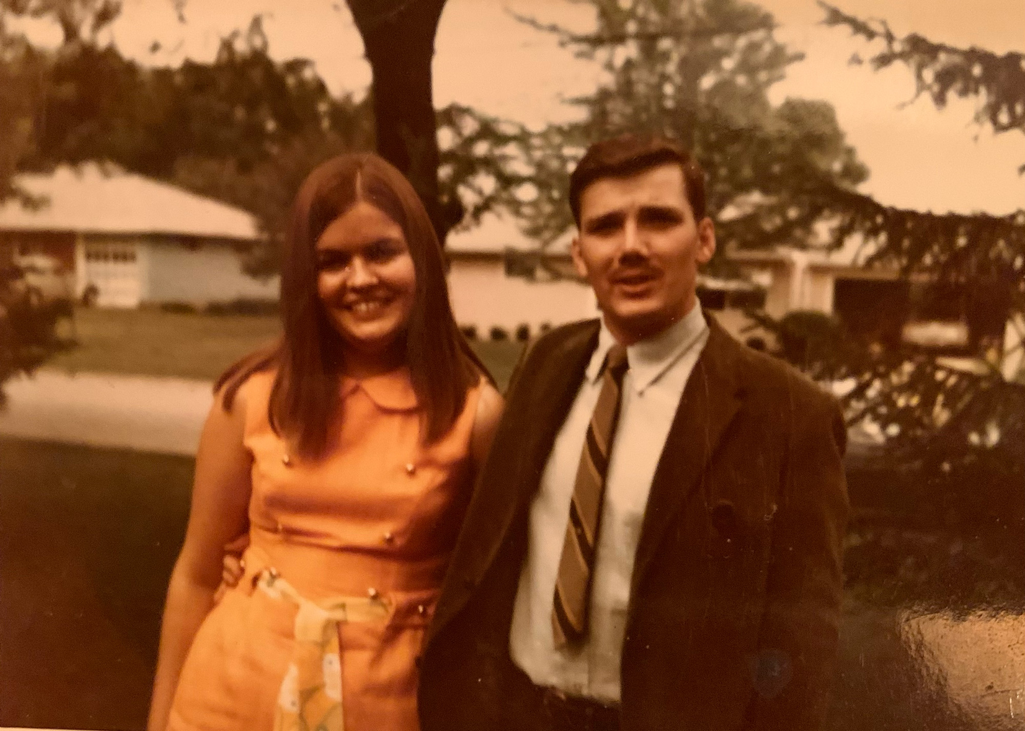 Terry and Puppi in front of his mother's home in Madison